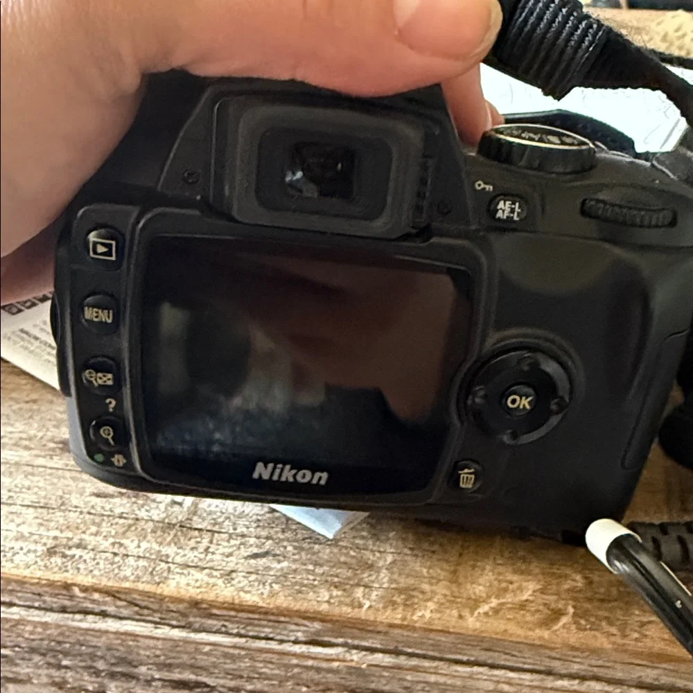 Nikon Black DSLR Camera with Lens and Carrying Case